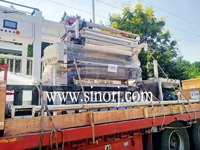 爆品pvc仿大理石板生產線板車發往國外